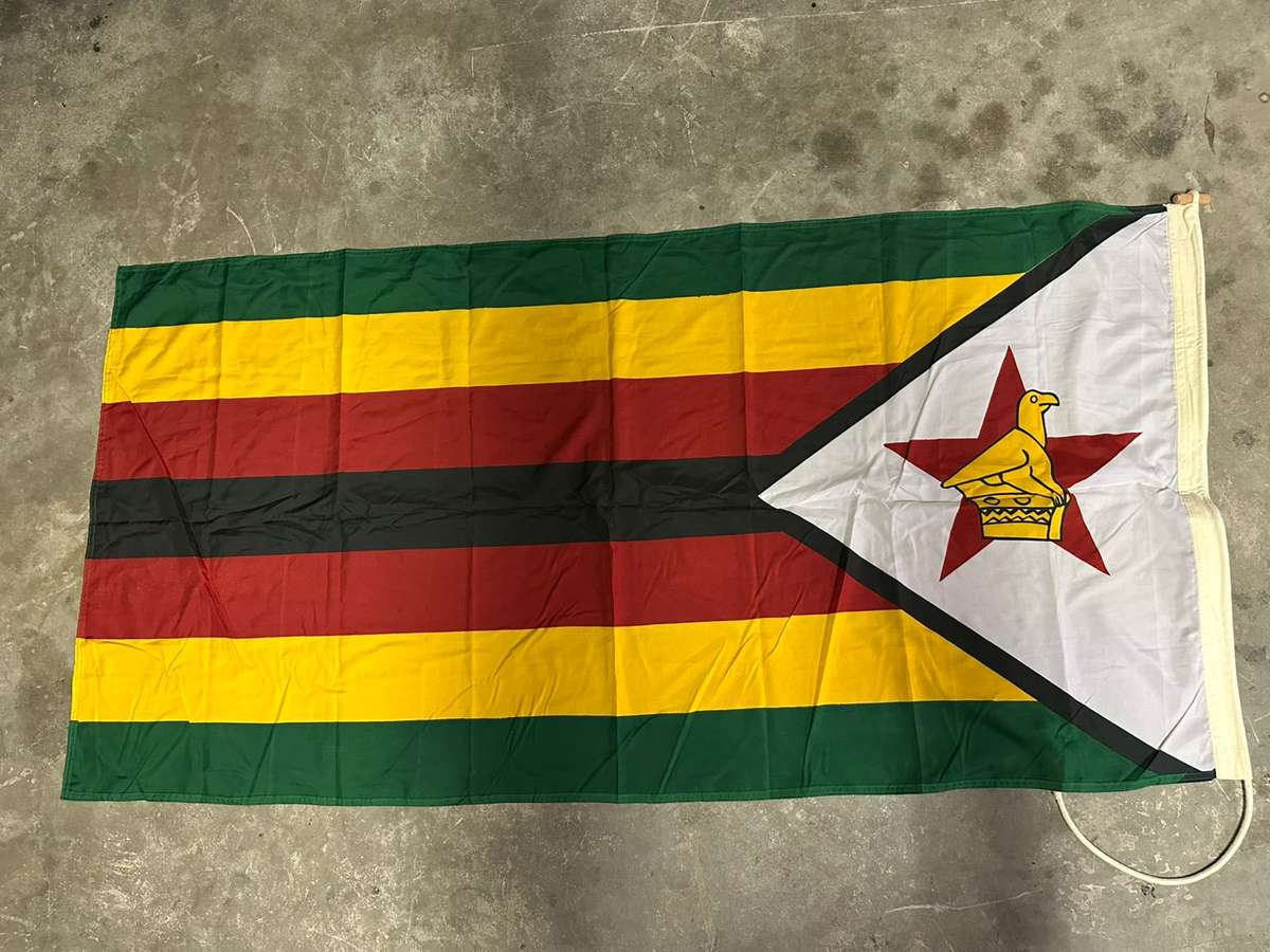Zimbabwe flag labelled, measures 170 x 80 cm, double sided, unused