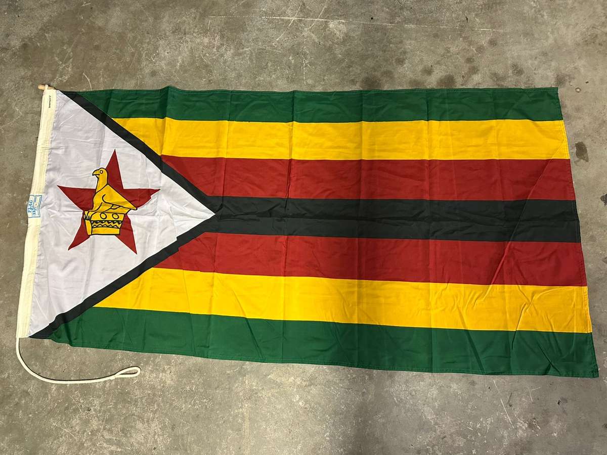 Zimbabwe flag labelled, measures 170 x 80 cm, double sided, unused
