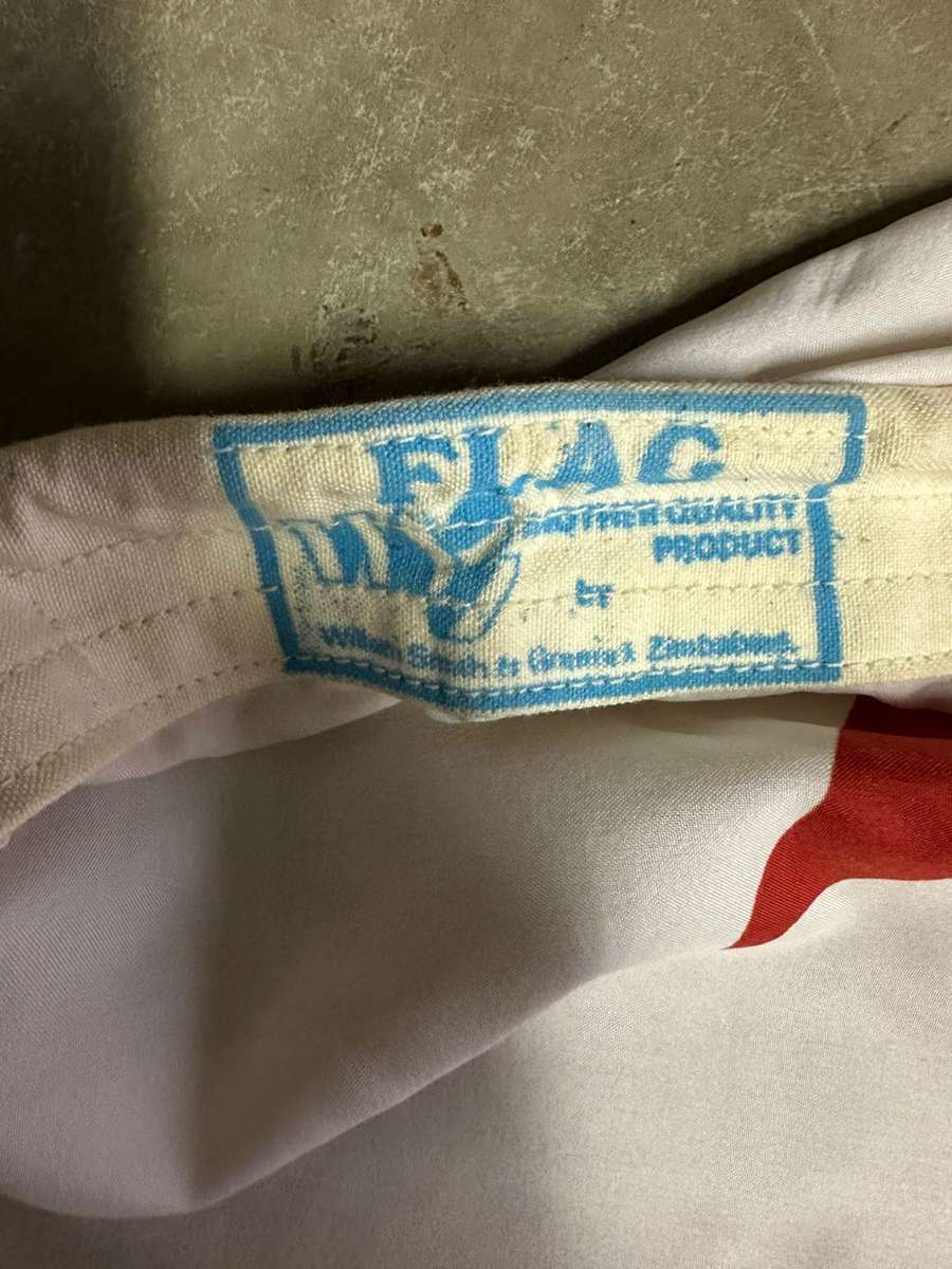 Zimbabwe flag labelled, measures 170 x 80 cm, double sided, unused