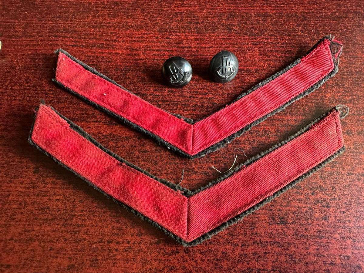 Rhodesia intaf. rank pair for Lance Corporal DA Grade 2. 1940's-1970's. Sold with 2 buttons.