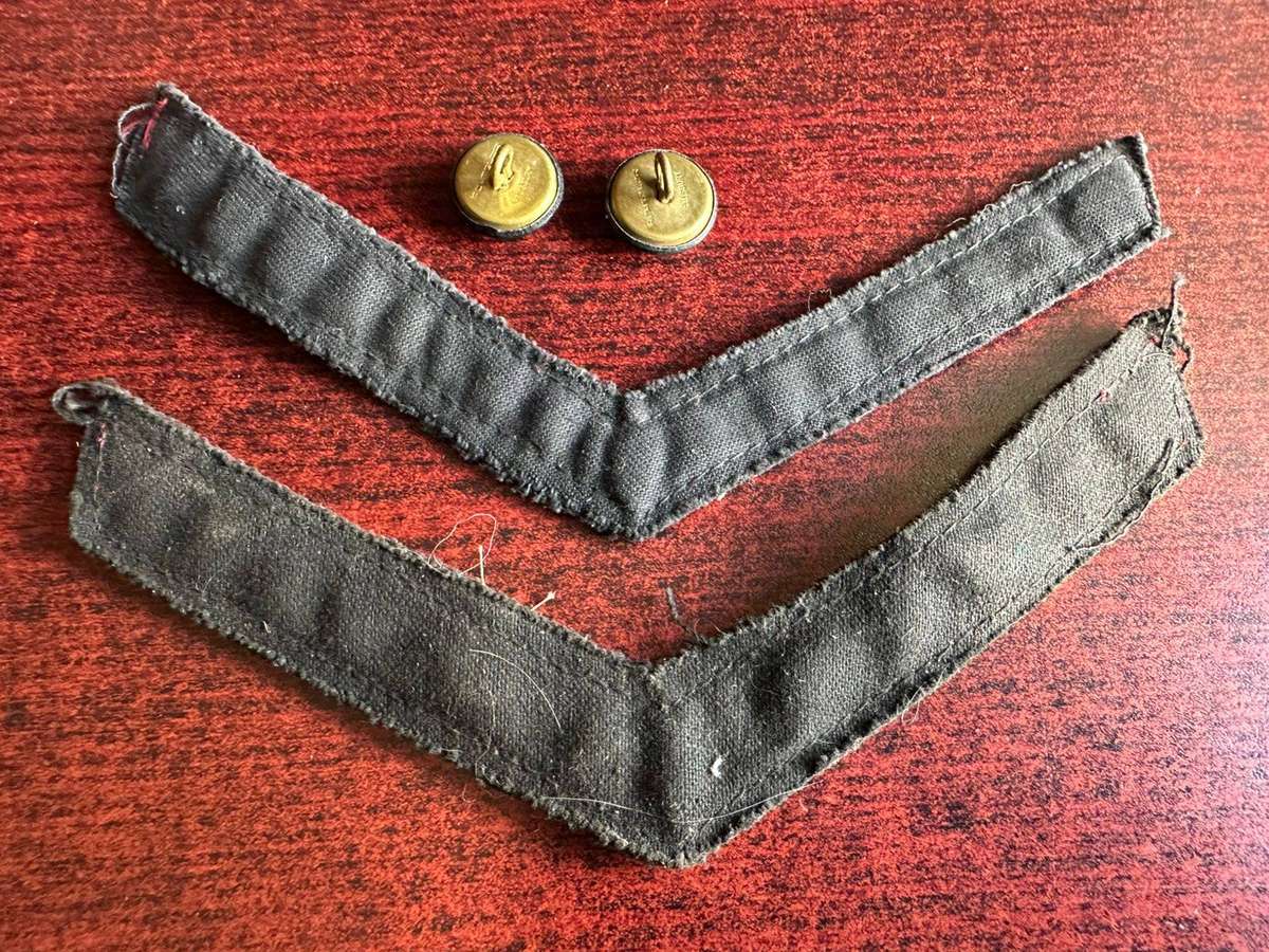 Rhodesia intaf. rank pair for Lance Corporal DA Grade 2. 1940's-1970's. Sold with 2 buttons.