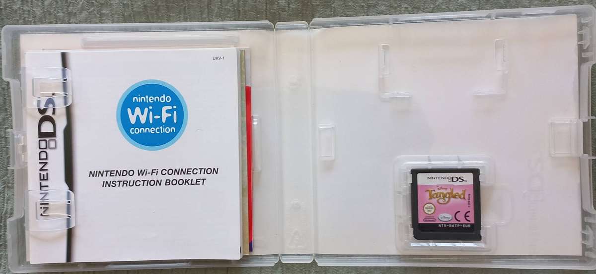 Maroon Nintendo DSI XL + 3 games / Nintendo DS