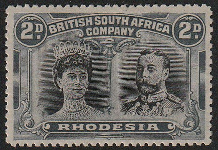 RHODESIA BSAC 1910 DOUBLE HEAD 2d BLACK AND SLATE SHOWING REENTRIES TO RIGHT SCROLLS MINT. SACC 129