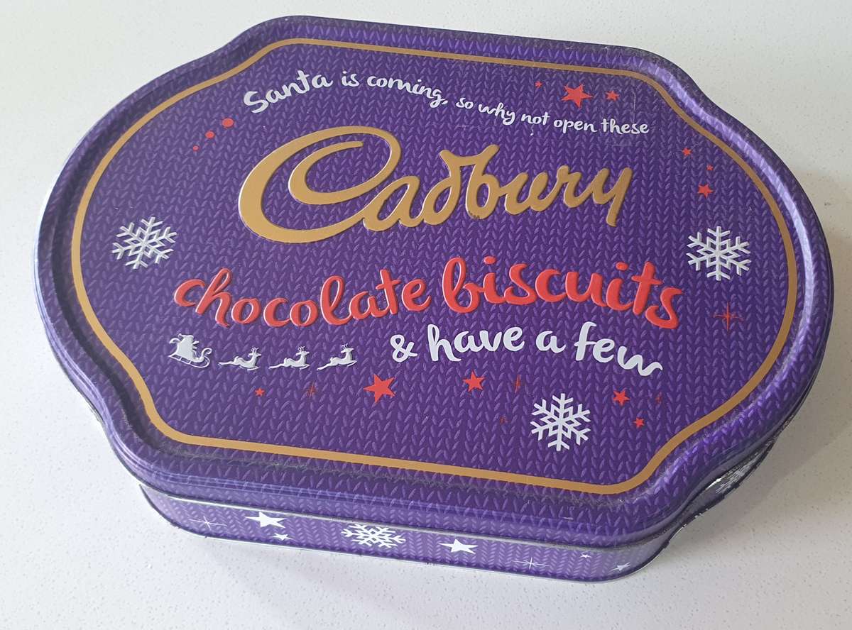 CADBURY tin as per photos