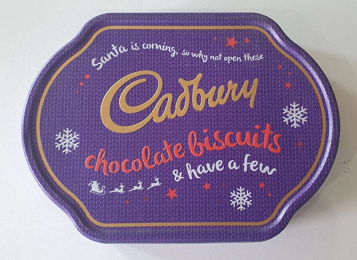 CADBURY tin as per photos