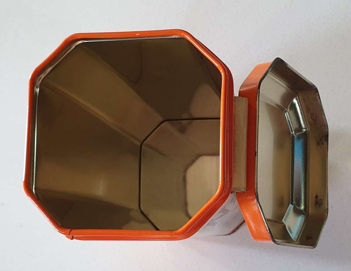 NESTLE tin as per photos