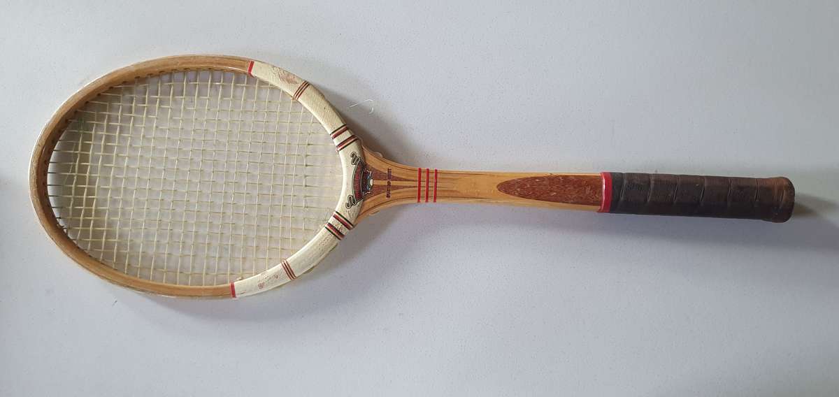 Vintage DUNLOP -made in SA- wooden tennis racket as per photo.