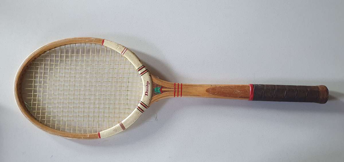 Vintage DUNLOP -made in SA- wooden tennis racket as per photo.