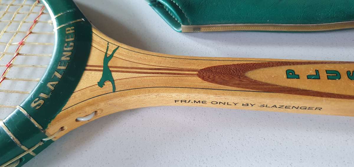 Vintage SLAZENGER PLUS -made in SA- wooden tennis racket with cover as per photo.