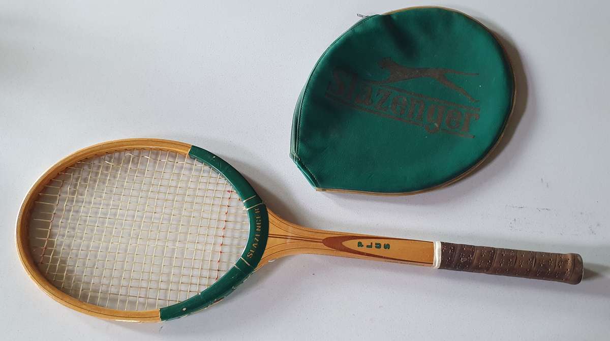 Vintage SLAZENGER PLUS -made in SA- wooden tennis racket with cover as per photo.