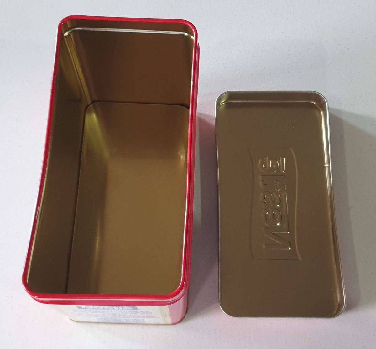 NESTLE tin as per photos