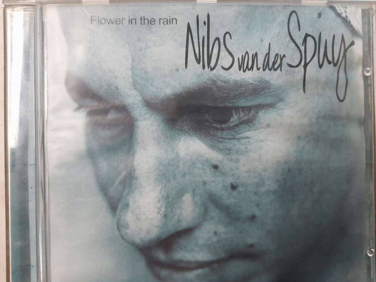 Nibs van der Spuy - Flower in the rain