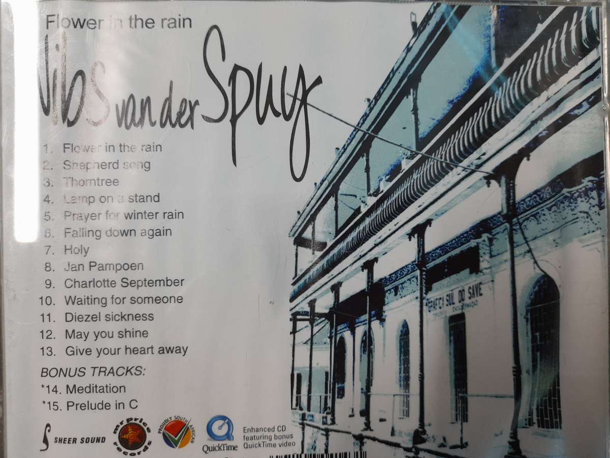 Nibs van der Spuy - Flower in the rain