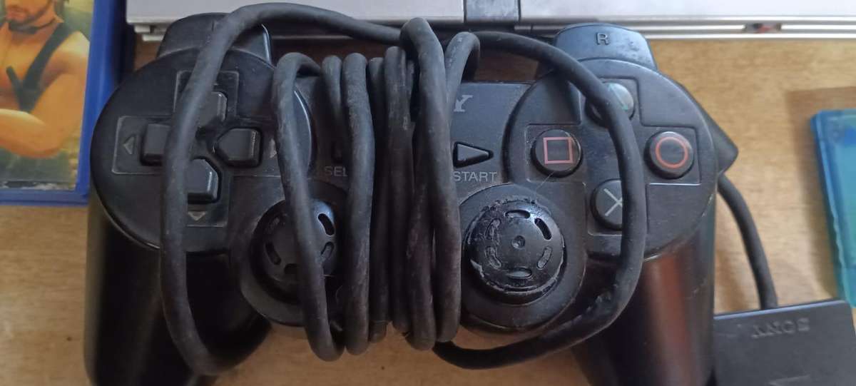 PS2 with 1 remote and memory card