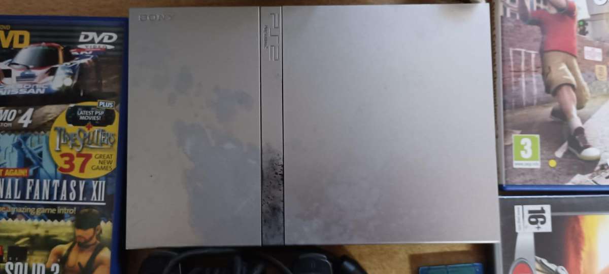 PS2 with 1 remote and memory card