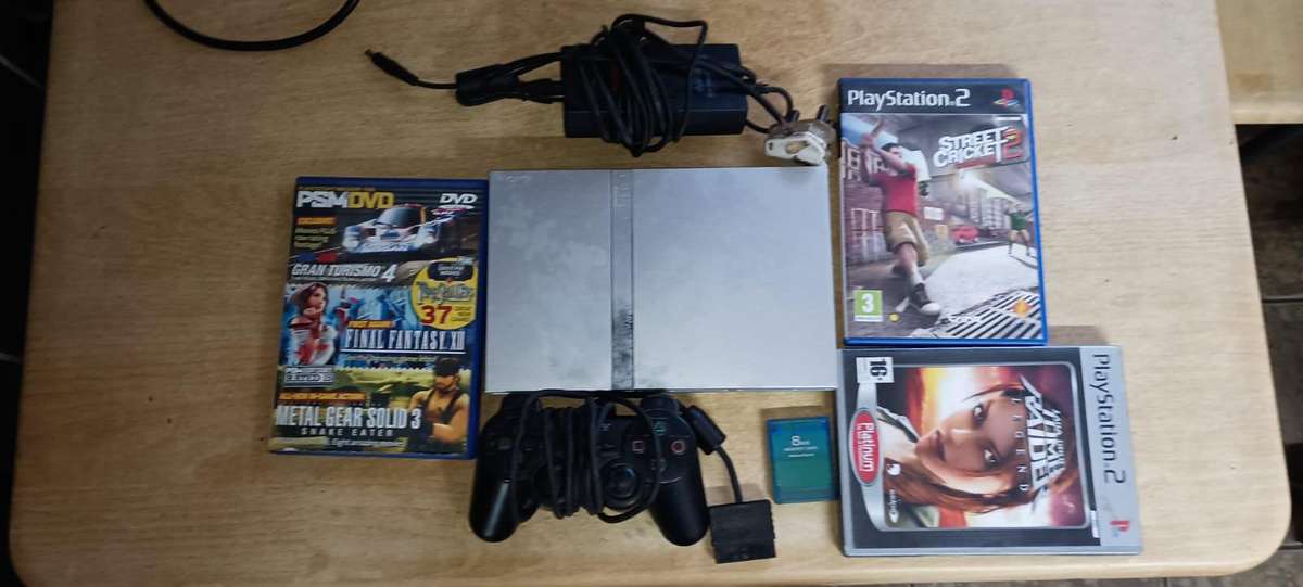 PS2 with 1 remote and memory card