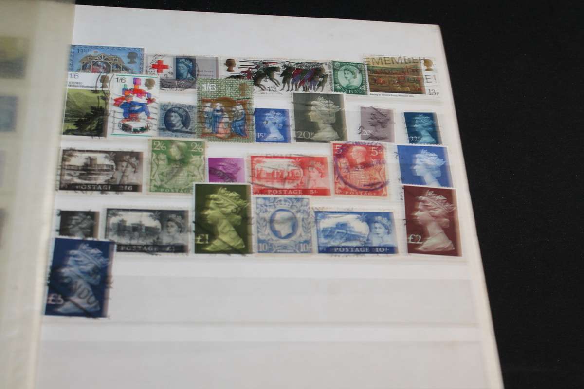 Album with Assorted Stamps Over 400 stamps