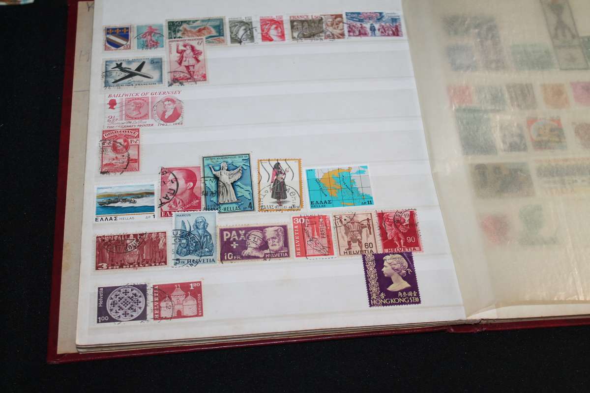 Album with Assorted Stamps Over 400 stamps