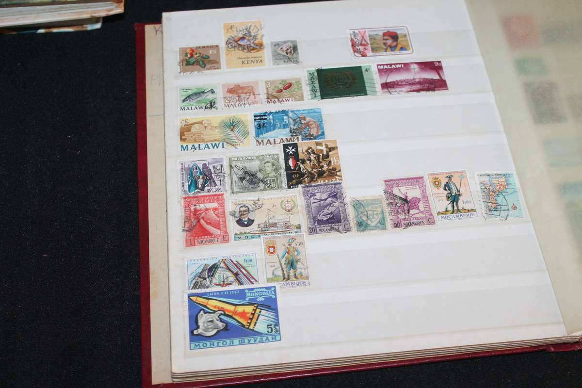 Album with Assorted Stamps Over 400 stamps