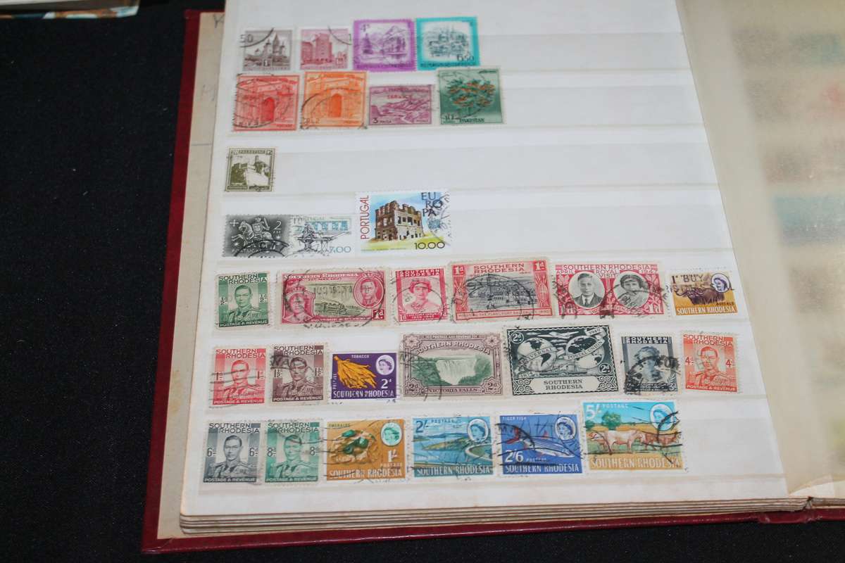Album with Assorted Stamps Over 400 stamps