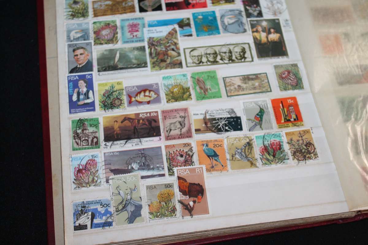 Album with Assorted Stamps Over 400 stamps