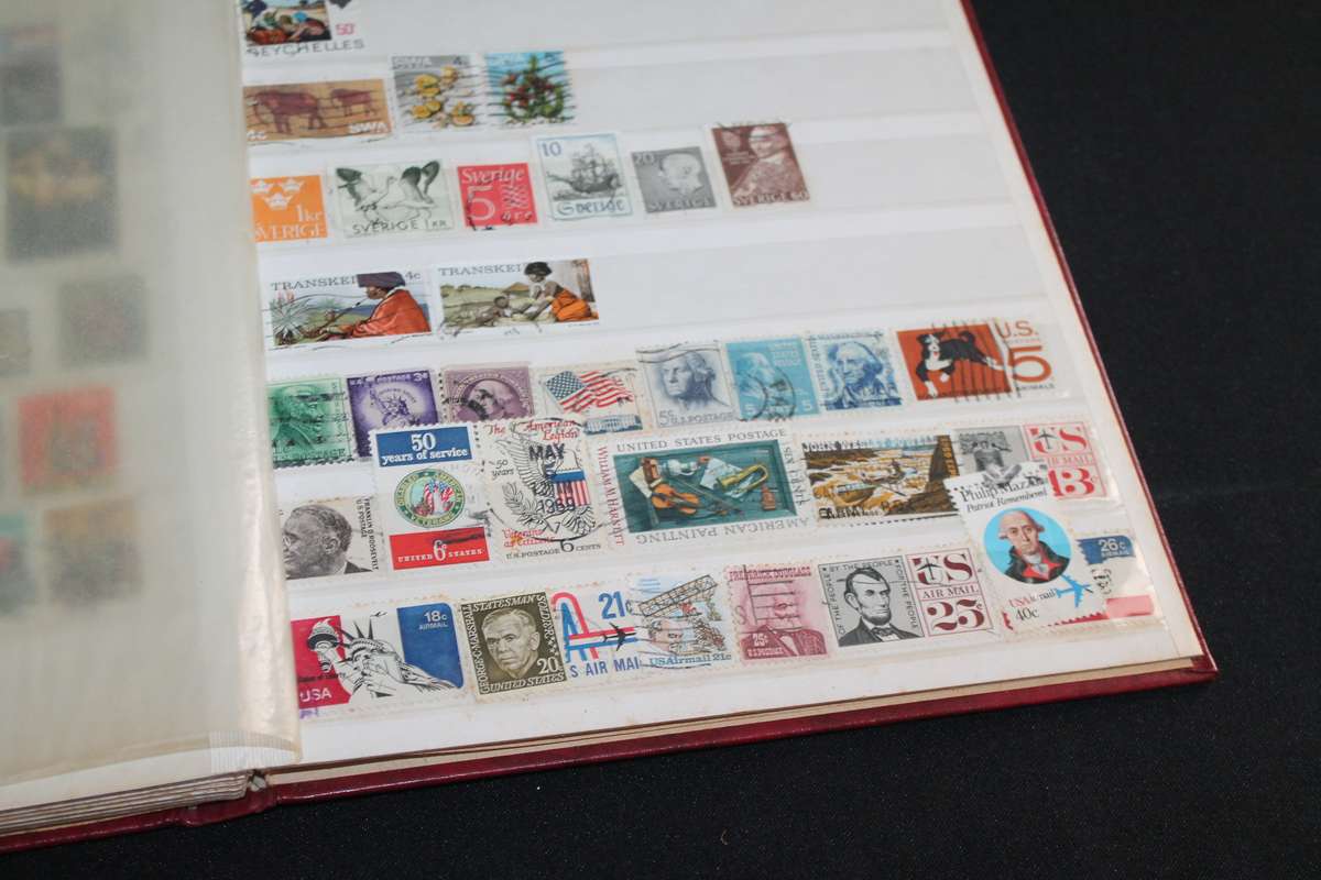 Album with Assorted Stamps Over 400 stamps