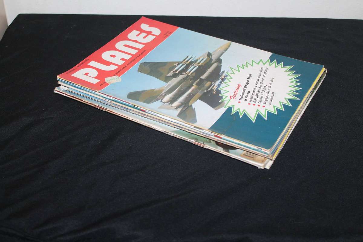8 Assorted Magazines on Planes