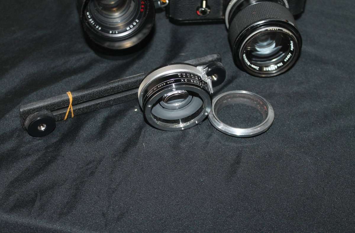 Nikon Film Camera with 2 Lenses and extra's