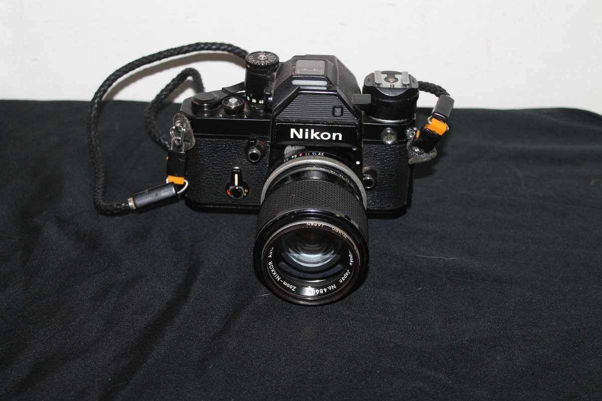 Nikon Film Camera with 2 Lenses and extra's