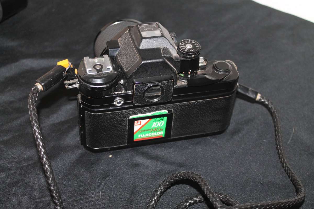Nikon Film Camera with 2 Lenses and extra's