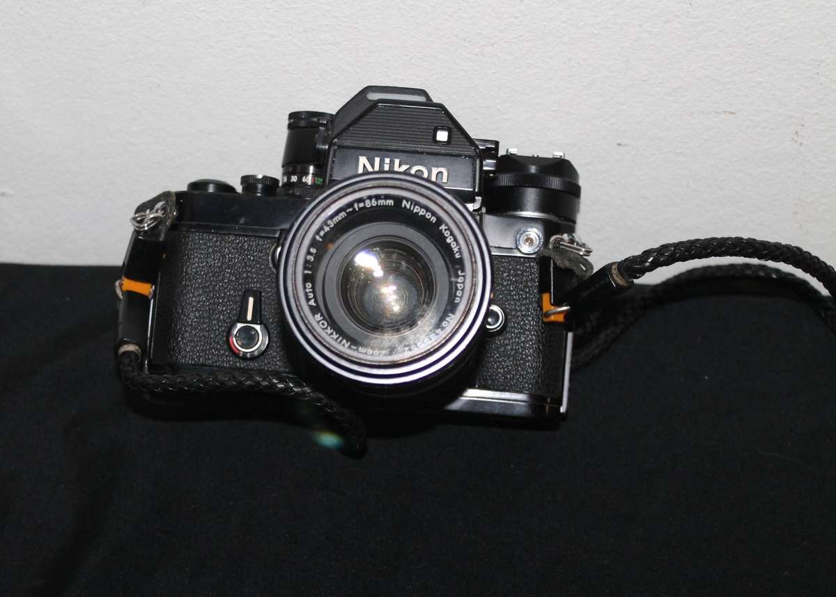 Nikon Film Camera with 2 Lenses and extra's