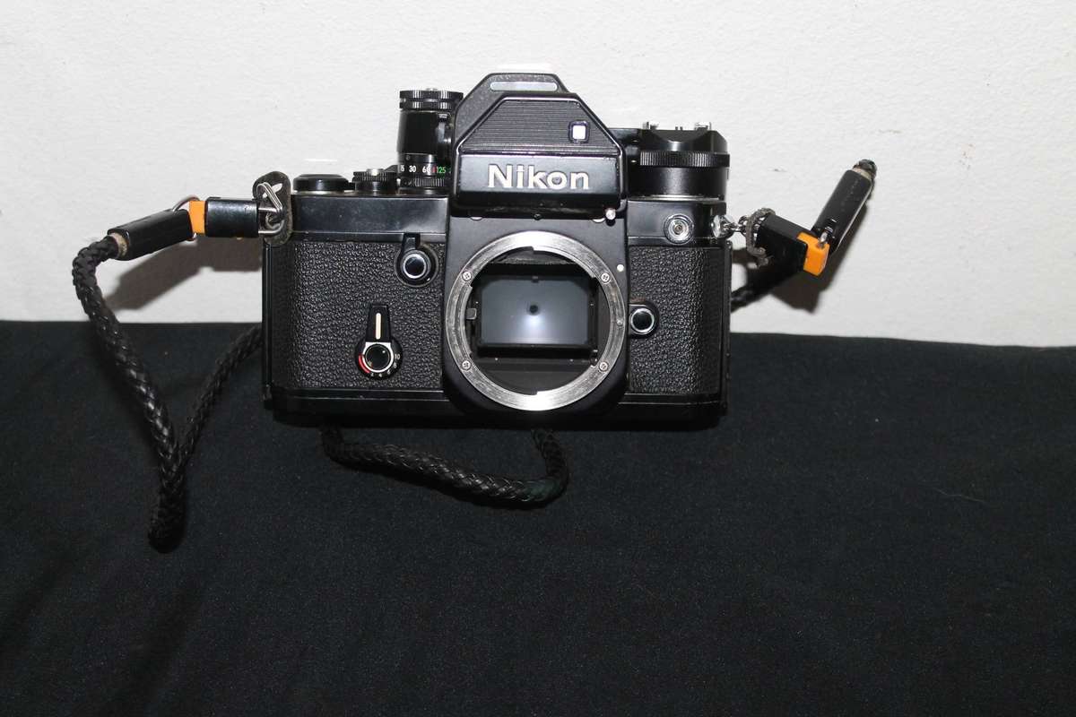 Nikon Film Camera with 2 Lenses and extra's