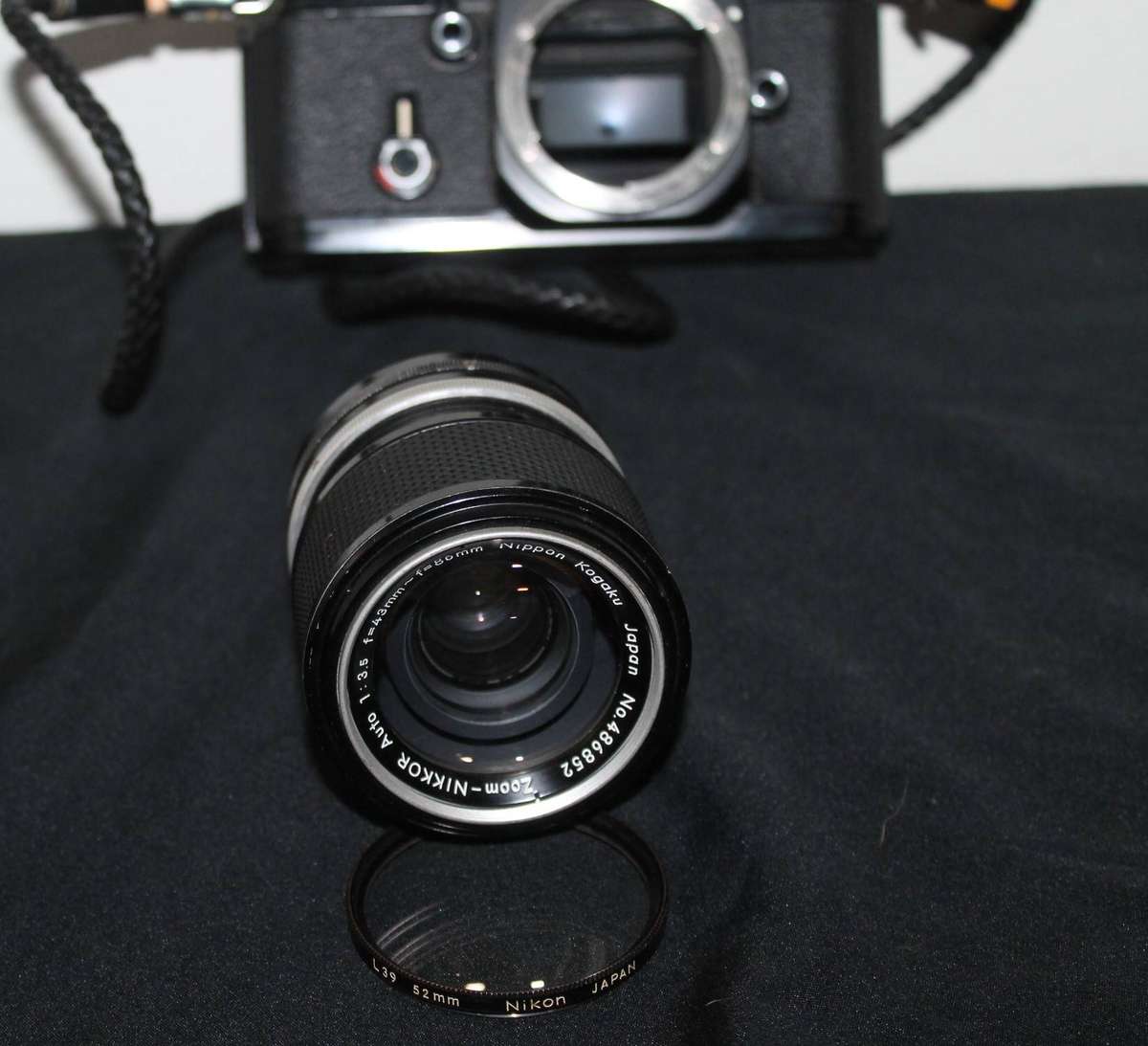 Nikon Film Camera with 2 Lenses and extra's