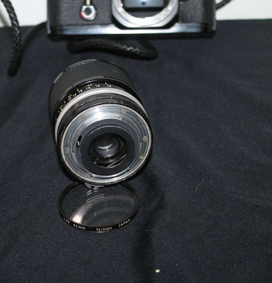 Nikon Film Camera with 2 Lenses and extra's