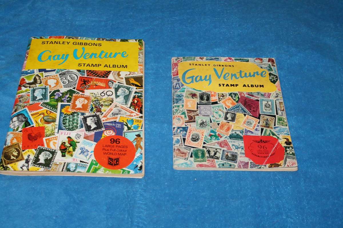 2 Stamp Albums with assorted stamps there are around 750 stamps in both