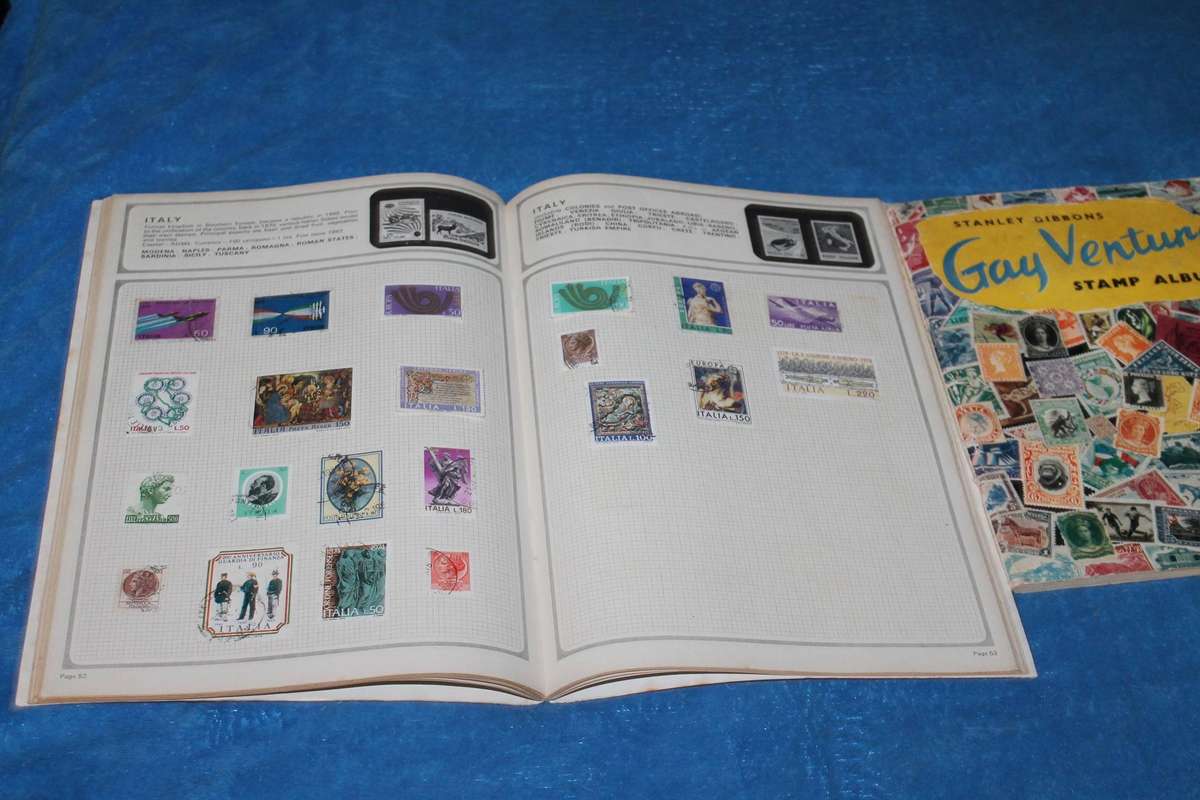 2 Stamp Albums with assorted stamps there are around 750 stamps in both
