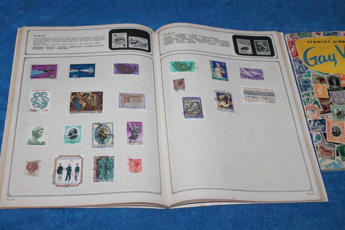 2 Stamp Albums with assorted stamps there are around 750 stamps in both