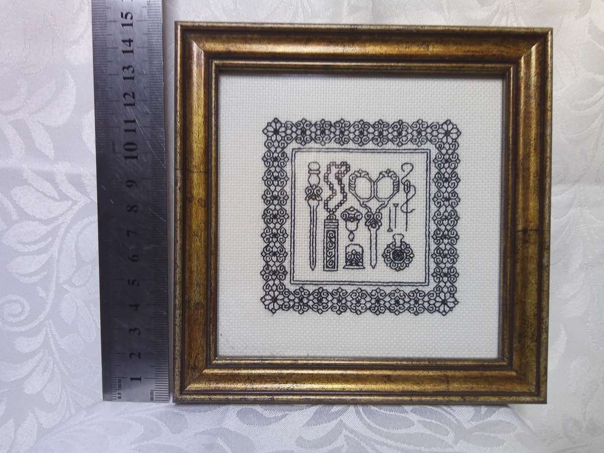 A gorgeous framed miniature embroidery