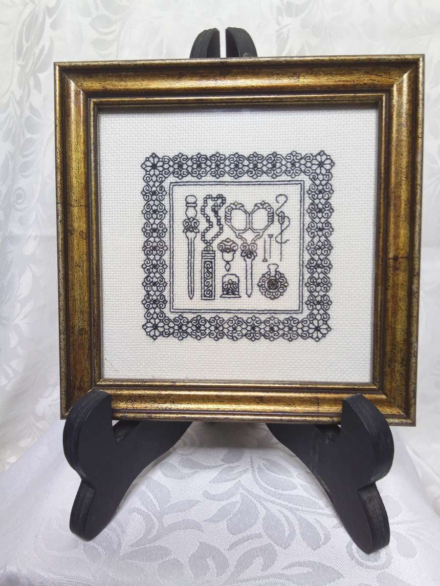 A gorgeous framed miniature embroidery