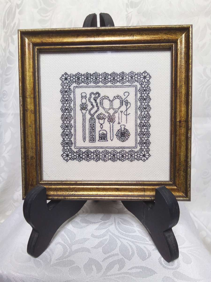 A gorgeous framed miniature embroidery