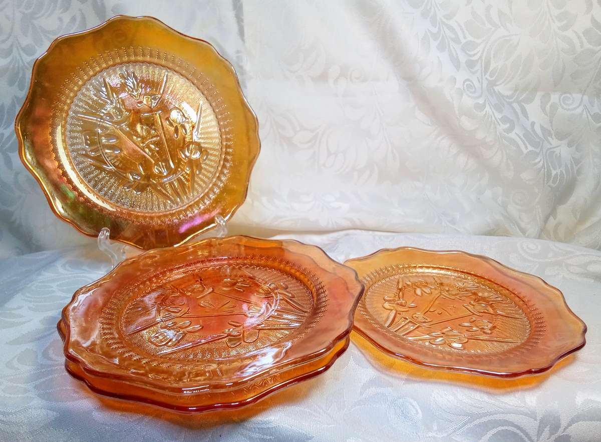 Four beautiful carnival glass "Iris & Herringbone"  marigold saucers - Jeannette Glass