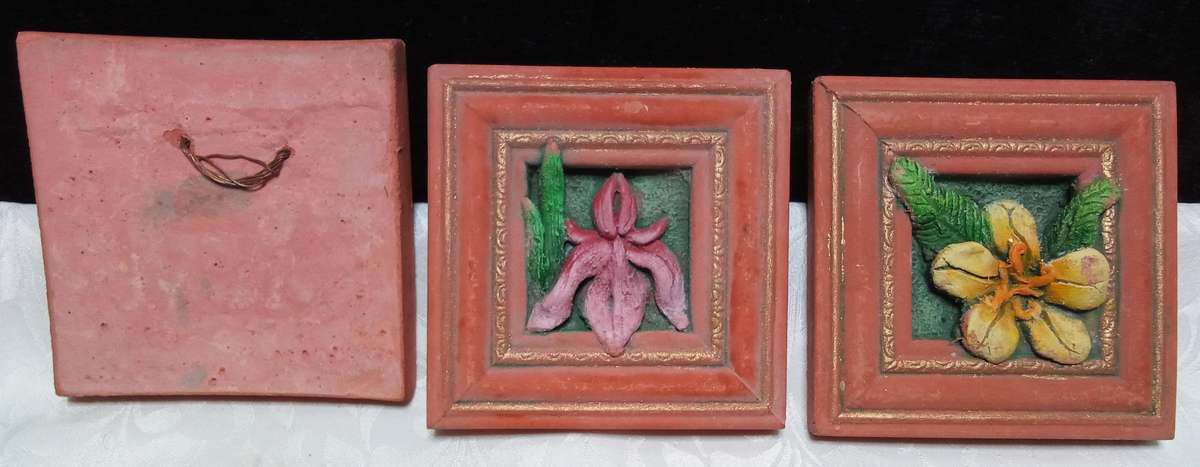 Three cut ceramic wall tiles