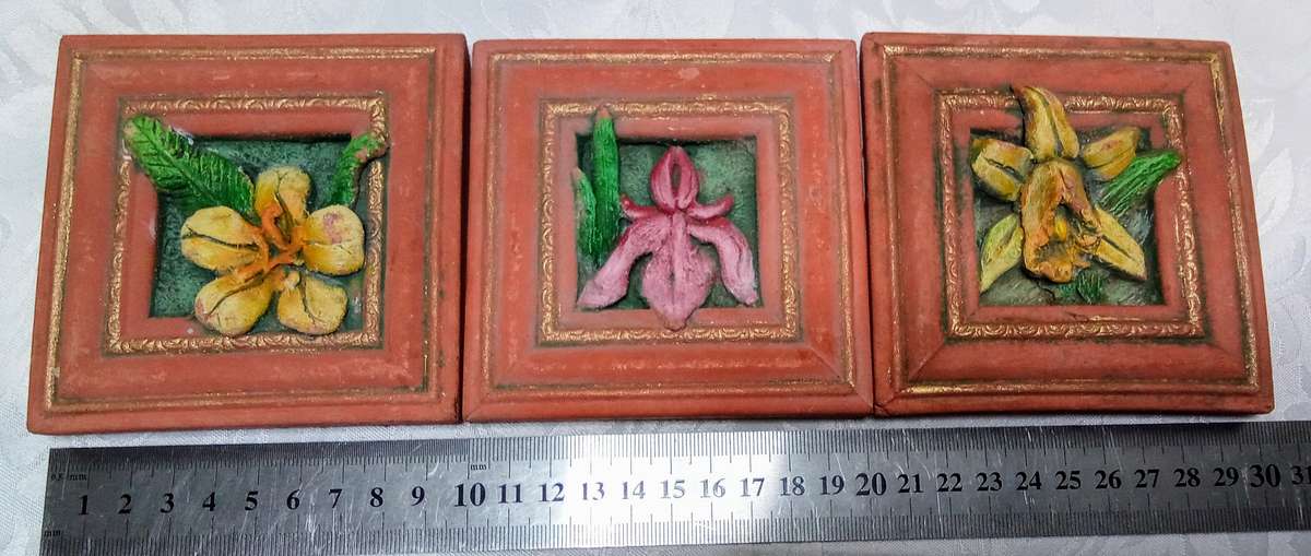 Three cut ceramic wall tiles