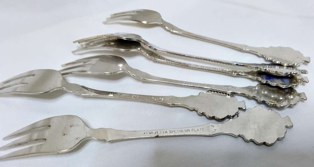 Six lovely cake forks