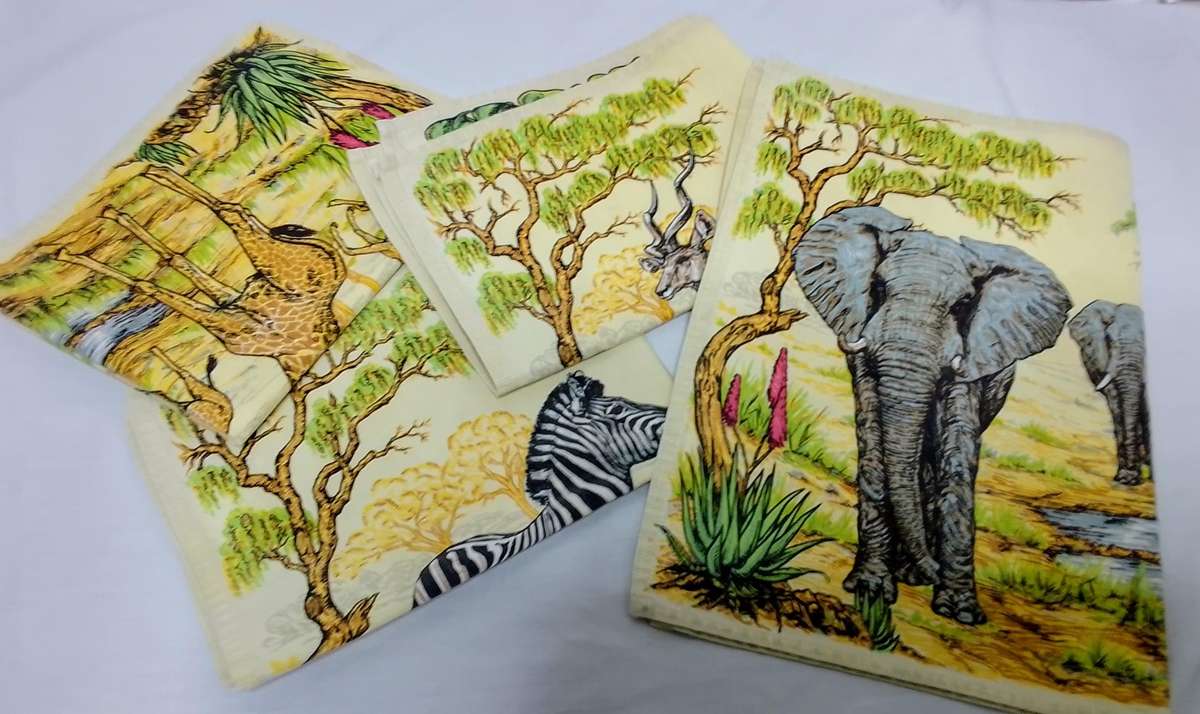 Four vintage Kruger park fabric place mats