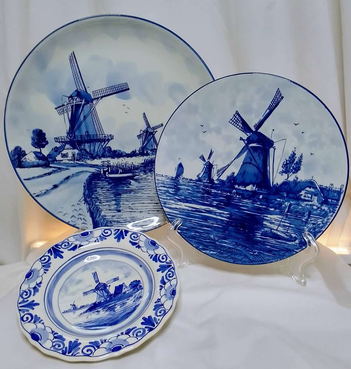 Three beautiful vintage handpainted Delft plates