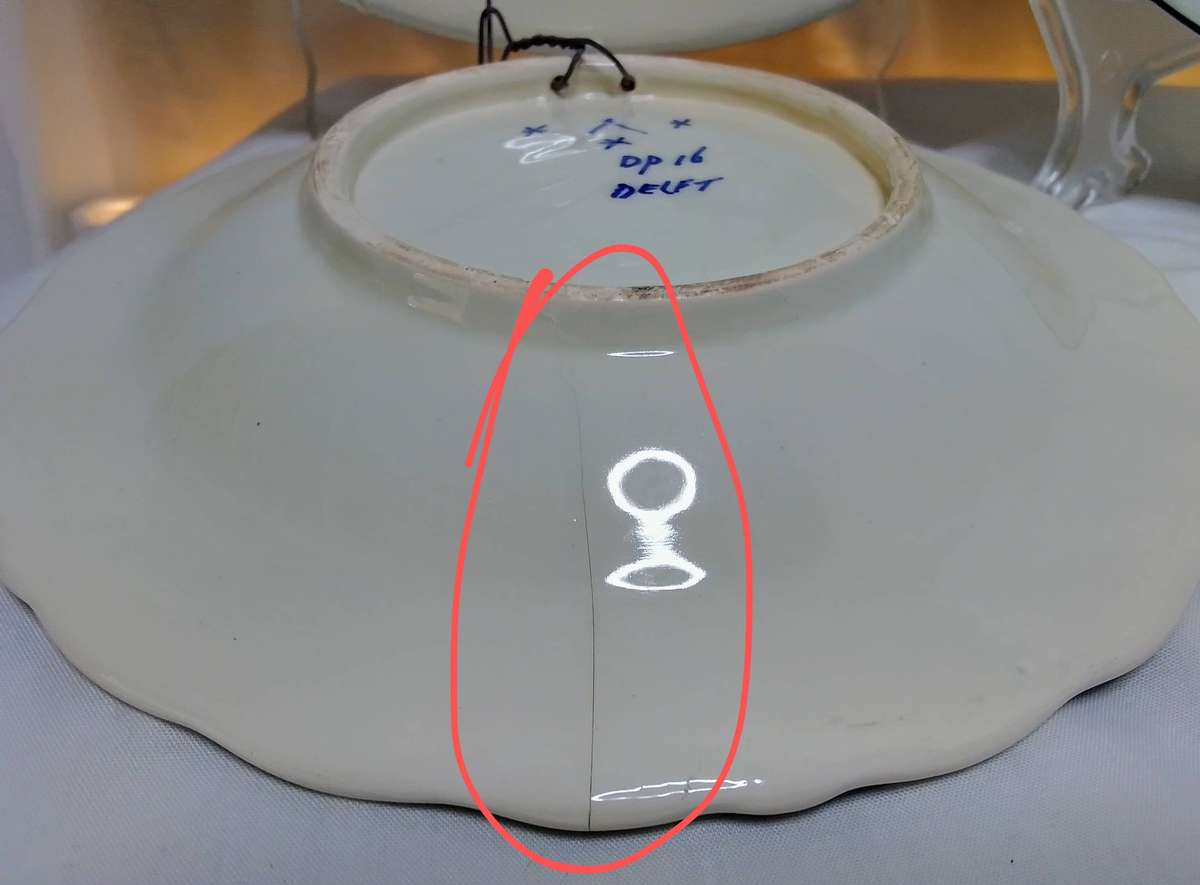 Three beautiful vintage handpainted Delft plates