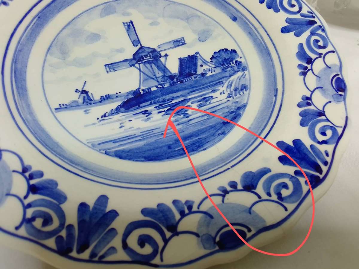 Three beautiful vintage handpainted Delft plates