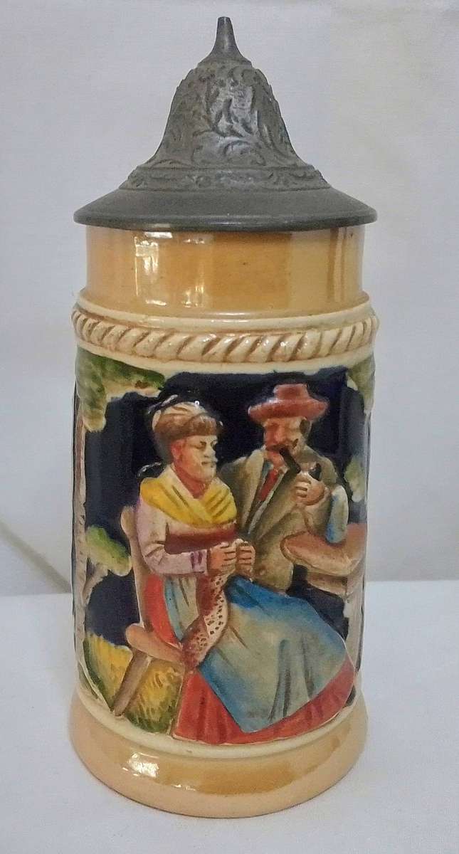 Stunning small vintage German beer stein with pewter lid