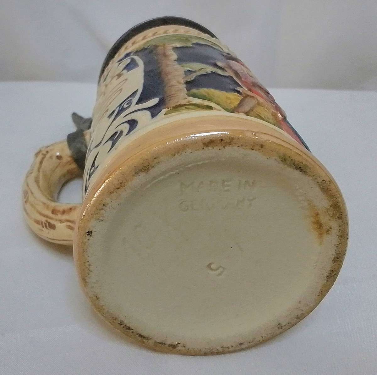 Stunning small vintage German beer stein with pewter lid